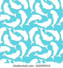 Seamless pattern with dolphins.