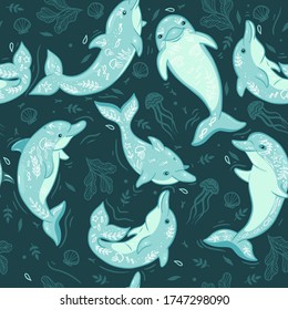 Seamless pattern with dolphins and sea elements. Vector graphics.