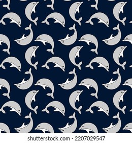 Seamless pattern with dolphins . Vector background on blue