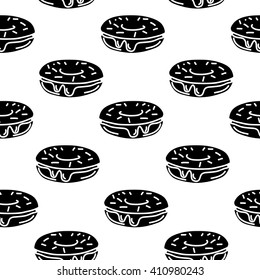 Seamless pattern with donuts. Abstract vector background in comic cartoon style. Line art. Black and white. Stylish print template for paper and fabric.