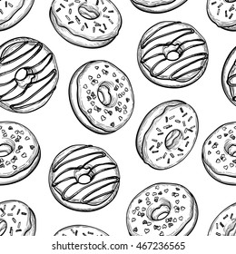 Seamless pattern with donuts. Hand drawn vector illustration.