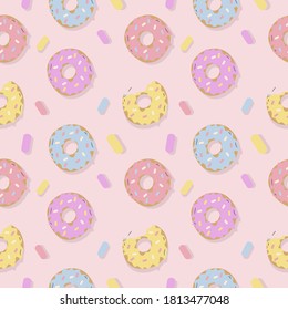 patrón transparente con donuts en fondo rosa