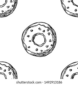 Seamless pattern of donuts. Vector cartoon background. Hand-drawn style.
