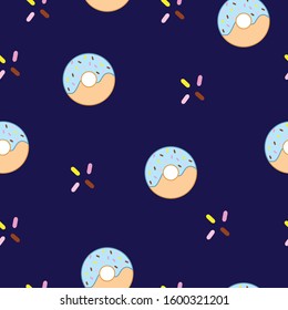 seamless pattern with donuts vector on dark blue background