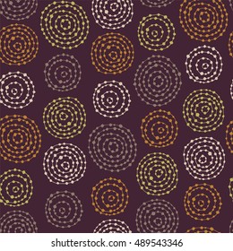 Seamless pattern with doodle circles randomly distributed.