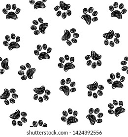 Patrón sin foco con garras de perro garabato. Impresión animal de color negro. Fondo vectorial.