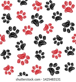 Seamless pattern with doodle dog paws. Black and red color animal print. Vector background.