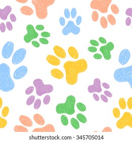 Seamless pattern with doodle dog paws. Colorful animal print. Vector background. 