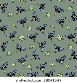 seamless pattern doodle dragonfly, butterfly, clover, green background