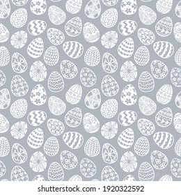 Seamless pattern with doodle easter eggs on grey background. Can be used for wallpaper, pattern fills, textile, web page background, surface textures