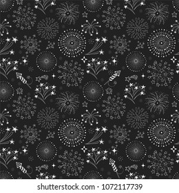 Seamless pattern with doodle fireworks on black background 