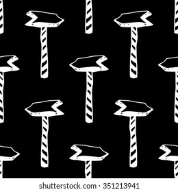 Seamless pattern with doodle hand draw wooden signs, signboard and direction arrows. Tiling background made of various empty road signs.