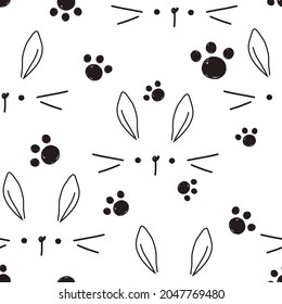 Seamless pattern with doodle hand drawn rabbit cartoons and paw prints on white background vector illustration.