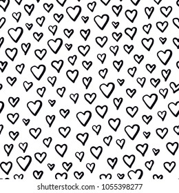 seamless pattern with doodle hearts