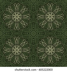 Seamless pattern doodle ornament. Green background. Ethnic motives. Zentangle