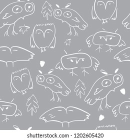 Seamless pattern with doodle owls and nature elements