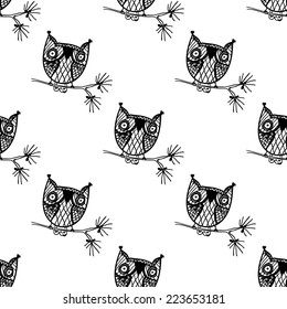 Seamless pattern with doodle owls on white background