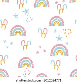 Seamless pattern with doodle rainbows, stars on white background vector illustration. Cute childish print.