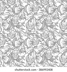 Seamless pattern in doodle style. Floral, ornate, decorative, vector design elements. Black and white monochrome background. Pomegranate fruit, branch, leaves. Zentangle hand drawn coloring book page