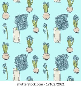 Seamless pattern in doodle style from twigs of herbs, leaves, spring flowers. Pattern on a blue background for prints on fabric, paper.