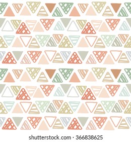 Seamless pattern of doodle triangles on white background. Ethnic seamless pattern. Tribal background. Infinity hand drawn geometric pattern. Vector illustration.