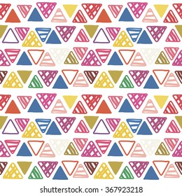 Seamless pattern of doodle triangles on white background. Ethnic seamless pattern. Tribal background. Vector illustration.