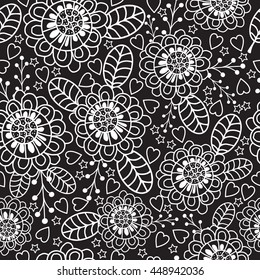 Seamless pattern with doodles elements for design. black and white flowers, leaves, heart