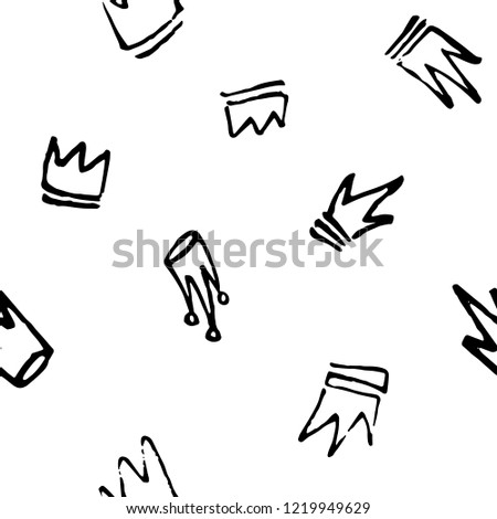 Seamless pattern of doodles hand drawn crowns. Vector illustration EPS 10