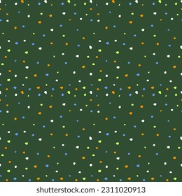 Seamless pattern with dots. Doodle round shapes endless texture on green background. Colorful vector illustration