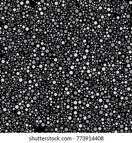Seamless pattern with dots on black background. Vector