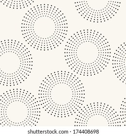 Seamless pattern with dotted circles. Vector repeating texture. Stylish background
