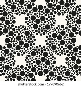 Seamless pattern with dotted circles. Vector repeating texture. Stylish background