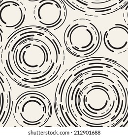Seamless pattern with dotted circles. Vector repeating texture. Stylish background