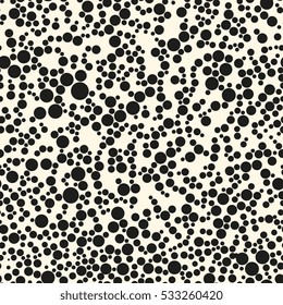 Seamless pattern with dotted circles. Vector repeating texture. Stylish background