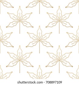 Seamless pattern of dotted golden leaves. Vector illustration.