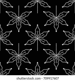 Seamless pattern of dotted leaves. Vector illustration.