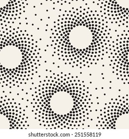 Seamless pattern with dotted rings. Vector repeating texture. Stylish monochrome background