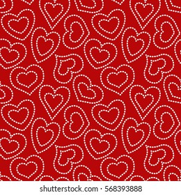 Seamless pattern with dotted white hearts of different form on a red background. Vector eps 10.