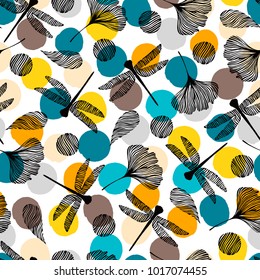 Seamless pattern with dragonflies and ginkgo leaves.