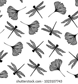 Seamless pattern with dragonflies and ginkgo leaves.