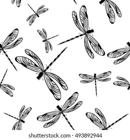 Seamless pattern with dragonflies on white background. Vector illustration.
