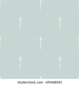 Seamless pattern with dragonflies. White silhouettes of dragonflies on a pastel blue background. Light illustration in vintage or Japanese style