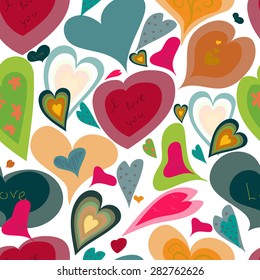 Seamless pattern with drawing colored hearts on white background