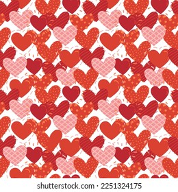 Seamless pattern with drawing se different hearts in red and pink tones, Valentine's drawing