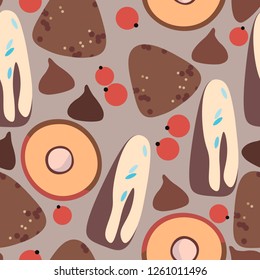 seamless pattern with drawn chocolate candies and red berries