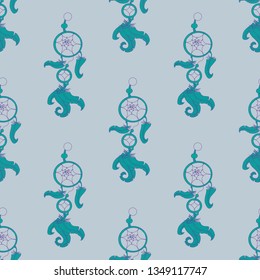 Seamless pattern of dream catcher and feathers on grey background