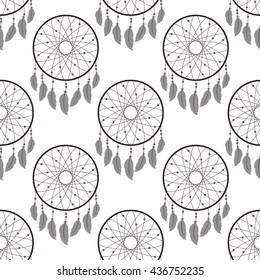 Seamless pattern with dream catchers.Vector illustration on white background. Dream catchers with feathers