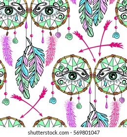 Seamless pattern with a dreamcatcher, feathers and all seeing eye. Hand drawn design in boho style for fashion, print, cloth, textile, fabric, material, paper.  Shamanism, religion, occultism.