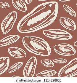 Seamless pattern with dried apricots on brown background.