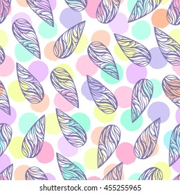 Seamless pattern with drop shapes on a polka dot background.